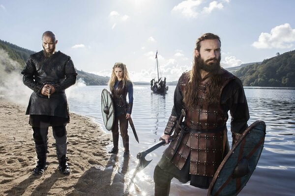 Viking Rognar Lodbrok by the river with his brother and sister