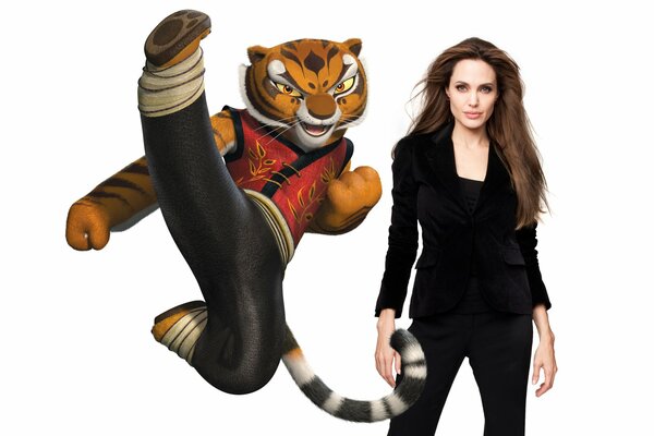 Anddelina Jolie in a black suit next to a tigress, which she voiced in kung fu panda