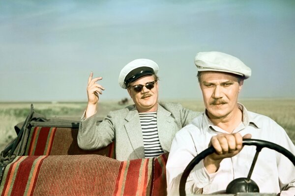 Mikhail Pugovkin and Ivan Brovkin are driving in a car