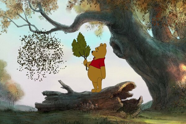 Winnie the Pooh con una rama contra las abejas