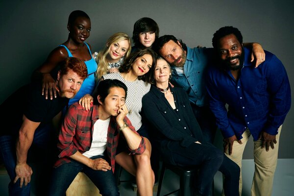 Actors from The Walking Dead with smiles