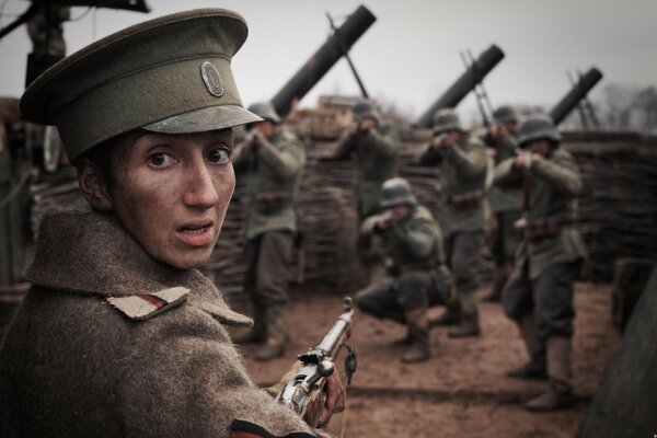 The face of the girl of the women s battalion in front of the enemies