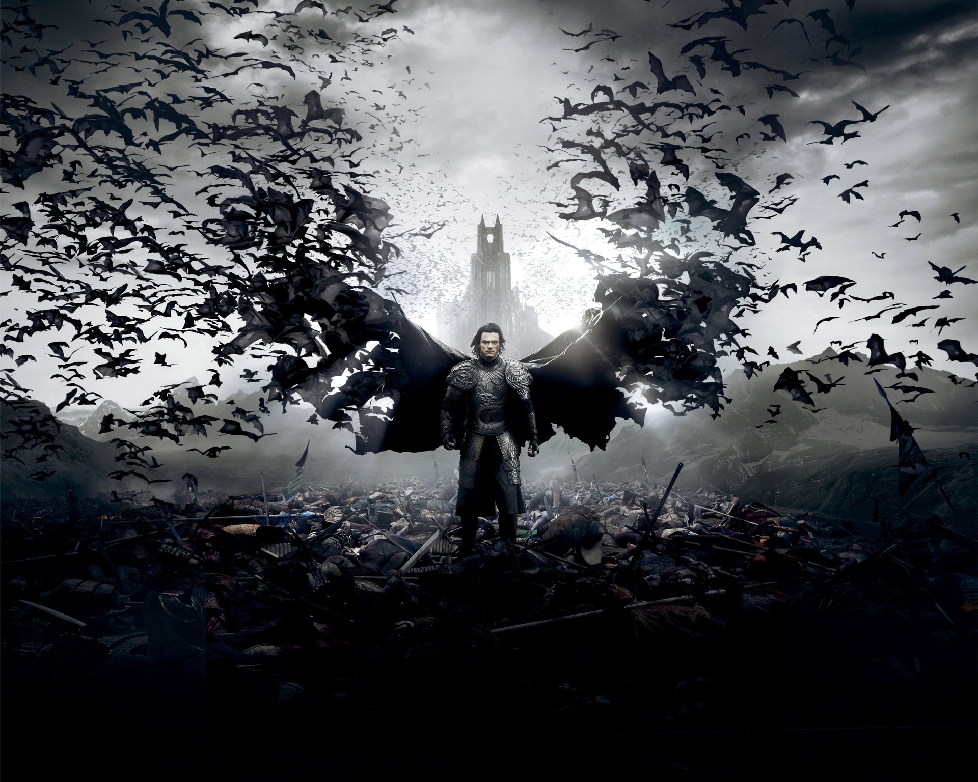 dracula untold dracula untold film film 2014 luke evans hrabia vlad tepes akcja dramat fantasy horror legendarne zdjęcia universal pictures człowiek wampir zbroja miecz broń nietoperze płaszcz skrzydła pole bitwy zmarli zwłoki zamek pałac niebo chmury