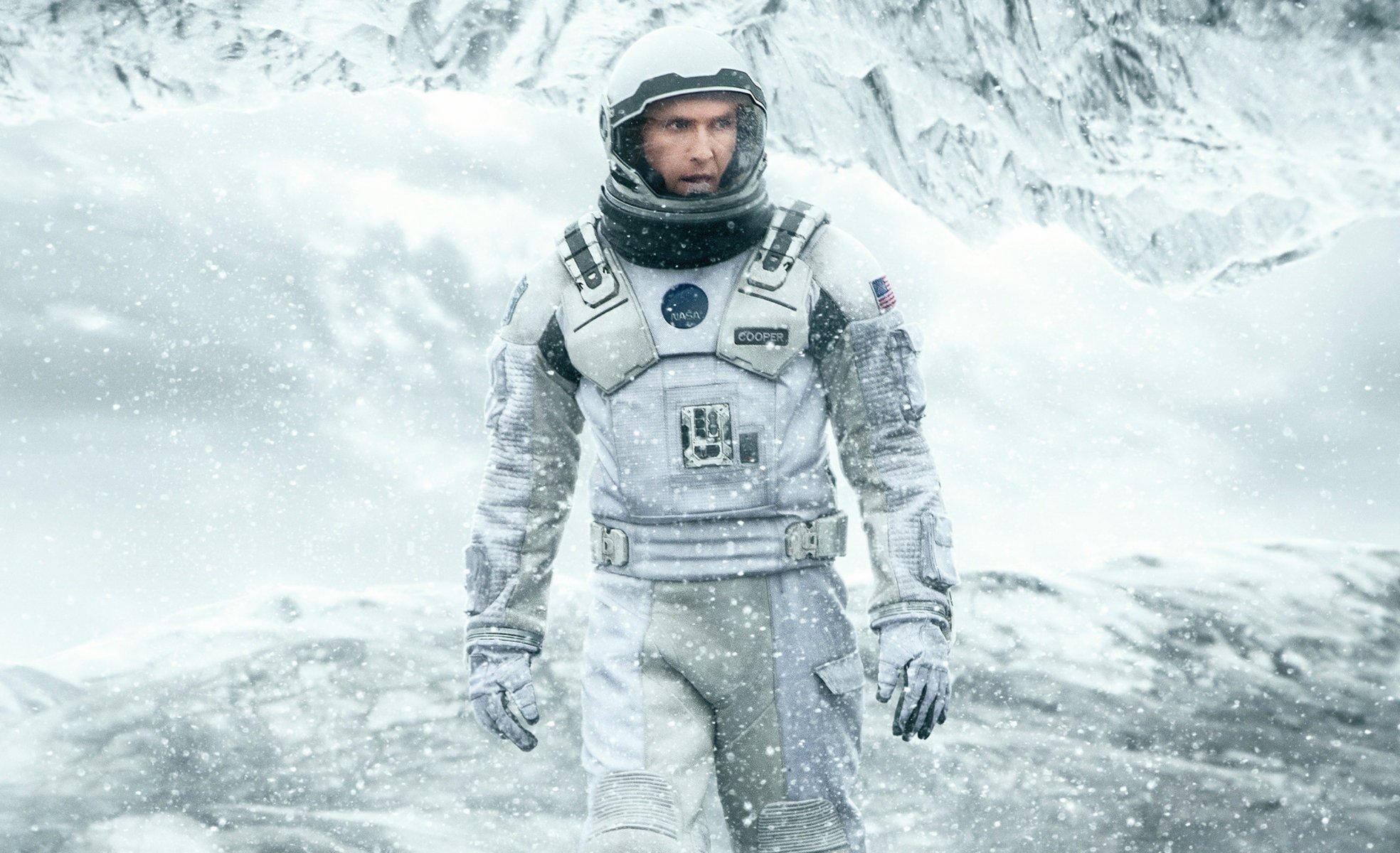 interstellar matthew mcconaughey cooper nasa 2014 movie movie astronaut flag cold ice snow mountains uniform spacesuit american flag helmet man