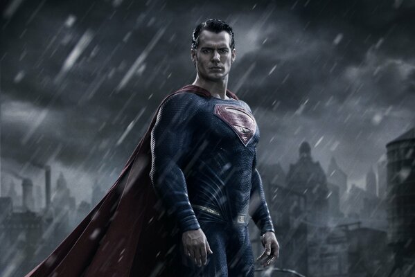 Superman in the rain, in the city at night