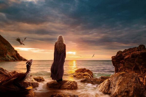 Game of Thrones Dragon Flight, daenerys Targaryen. Girl on a rock at sunset