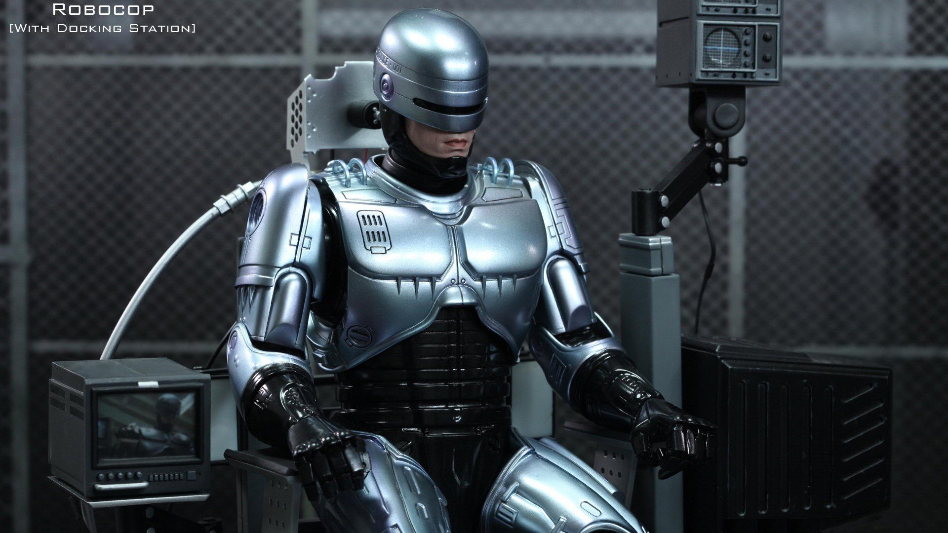 robocop héroe cyborg robot policía hierro armadura sentado recarga