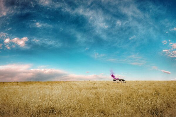 Photo of a car in a field from afar