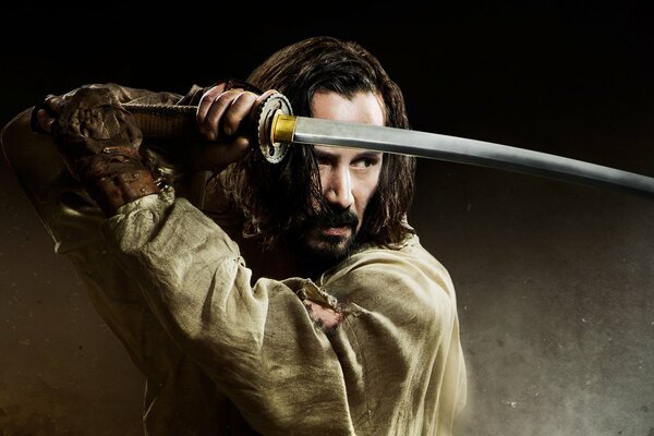 Keanu Reeves directs the sword in the movie 47 Ronin