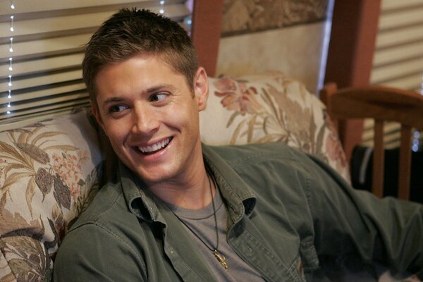 Dean Winchester smiles sweetly