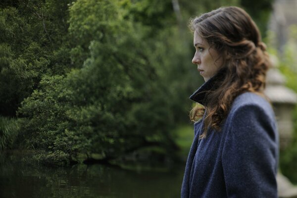 Rebecca Hall on the background of the forest from Awakening .
