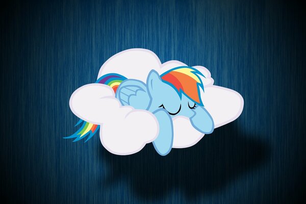 Little pony rainbow is sleeping on a cloud