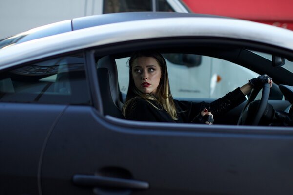 A shot from the movie three days to kill with Amber Heard