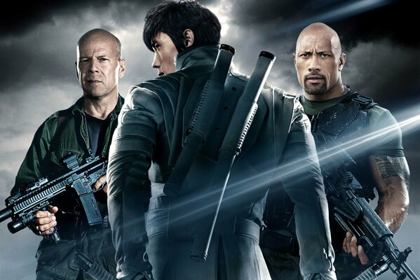 Dwayne Johnson Bruce Willis con ametralladoras