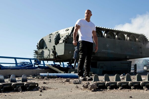 Vin Diesel in the movie Fast and Furious in a pink T-shirt