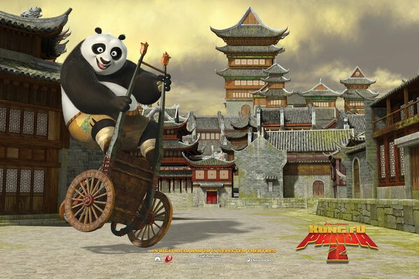 Kung Fu panda 2 rides a cart in front of the temple