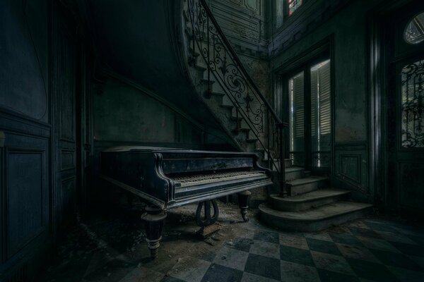 An old mysterious house with a piano and a staircase