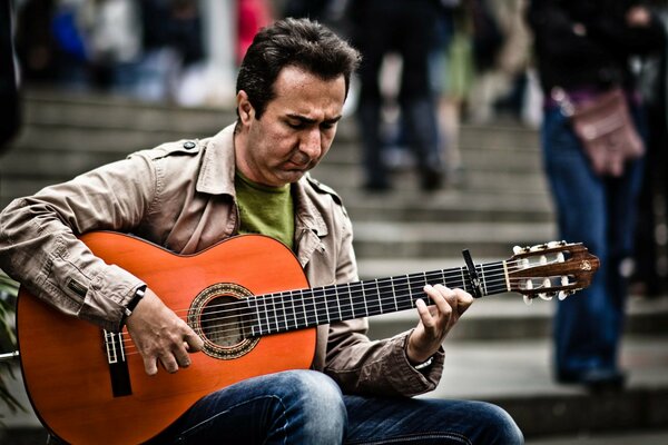 Guitarristas de la calle cuerdas de hombre