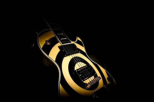 Electric guitar in black and yellow stripes