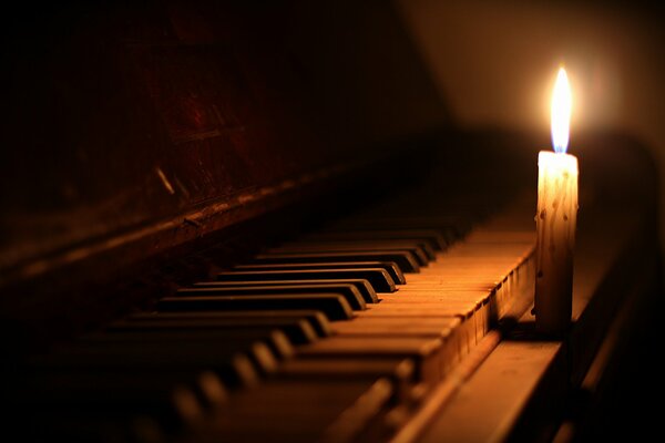 Candle fire on the piano