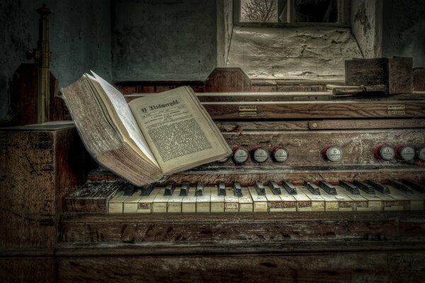 An old organ with a thick book