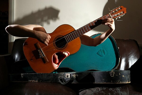 Фото-монтаж поющей гитары, играющей сама на себе