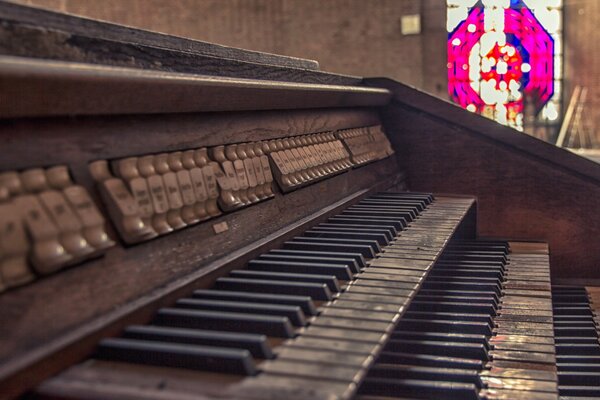 Three rows of keys of an ancient organ