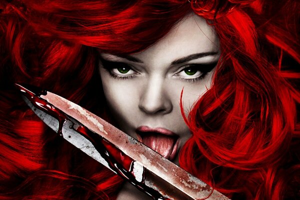 Red-haired Sonya licks the blood from the blade
