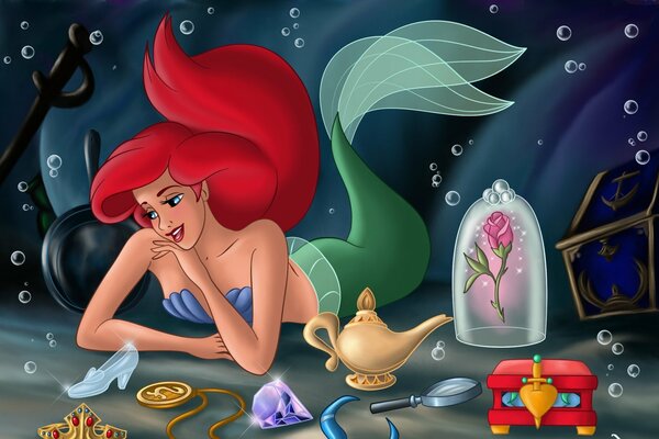 Mermaid Ariel looks at her treasures