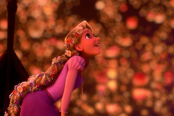 Rapunzel guarda le lanterne che vanno nel cielo