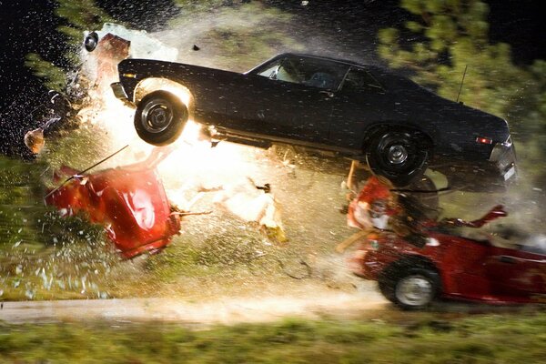 Foto del film di Quentin Tarantino Death Proof , auto che esplodono