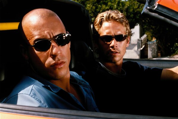 A picture from the movie fast and Furious with Vin Diesel and Paul Walker