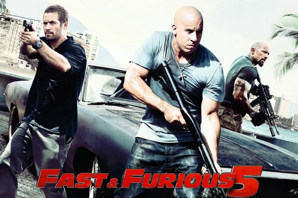 Vin Diesel, Paul Walker, Dwayne Johnson dans Fast and Furious 5