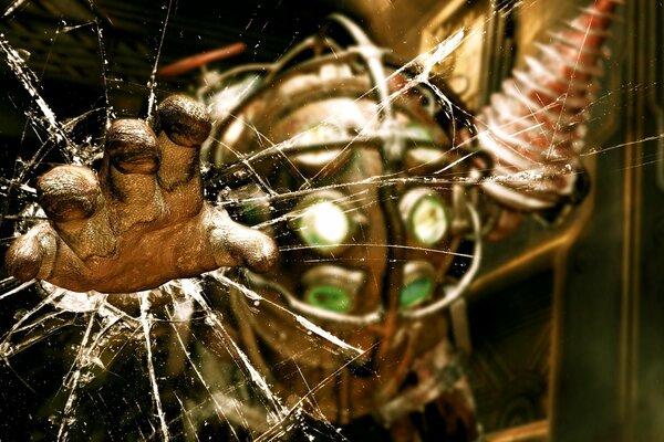 Big daddy from the game bioshock stretches his hand through the broken glass
