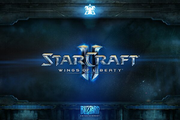 El emblema del juego StarCraft 2 alas de la libertad sobre un fondo oscuro