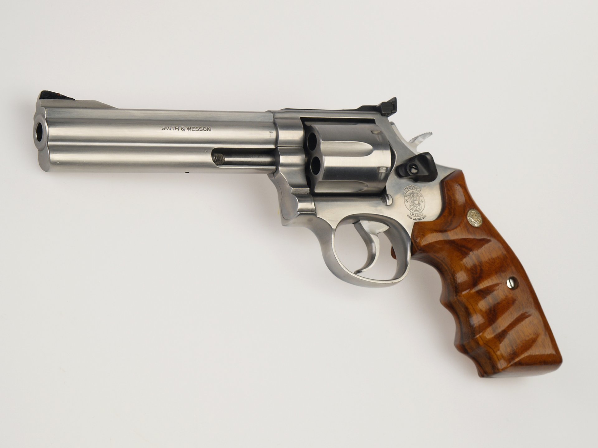 revolver metal wood fire arm