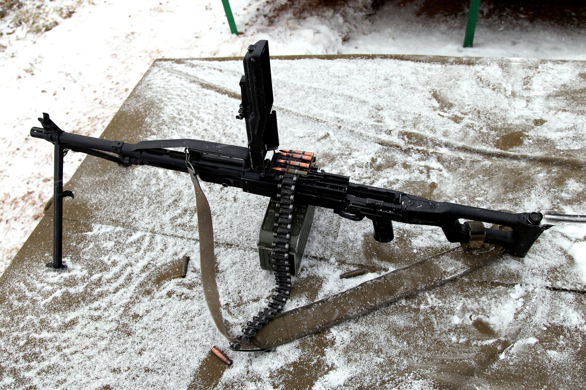 hooting range russian manual single machine gun pkp pecheneg view from above index grau 6p41 firing point cartridges 62×54 mm r box tape belt sleeves snow hardened barrel caliber interesting sample russia firearms weapons upgraded caliber 62 mm pool