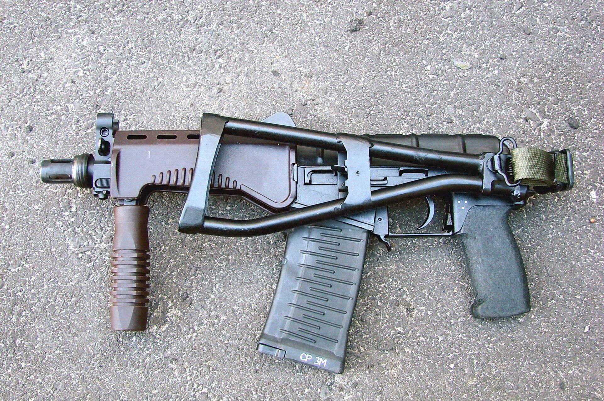 compact russia 9mm machine sr-3m developed by 1994 year possibility use silencer sector shop or cartridges metal to 30 cartridges 9 × 39mm sp-5 sp-6 installation optical and nightlife sights folding to the left framework butt flagey