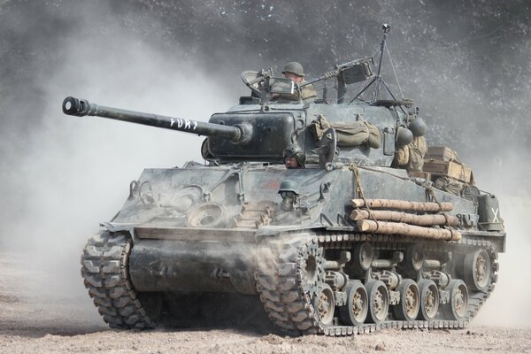 Weapon. Sherman medium tank in the dust