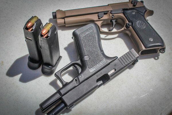 Black and brown pistols with pvtrons