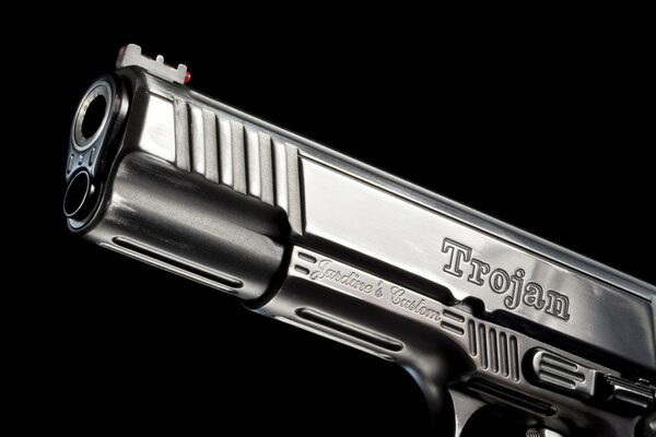 The barrel of the Trojan pistol is a metal weapon