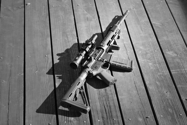 AR - 15 assault rifle on boards