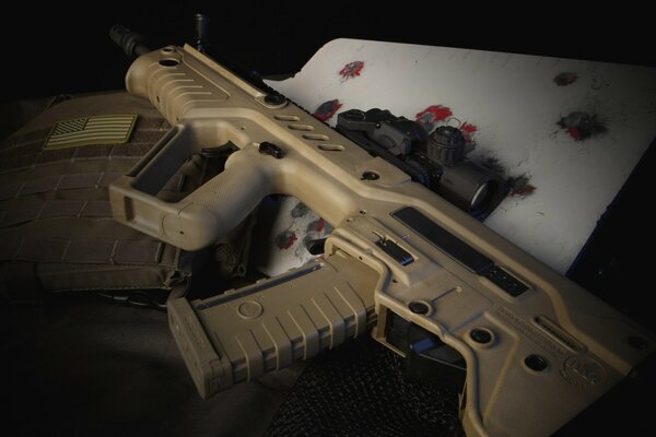 Tavor-an assault rifle is lying on the table