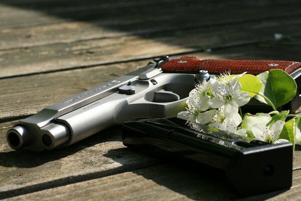 Self-loading pistol with cherry blossoms