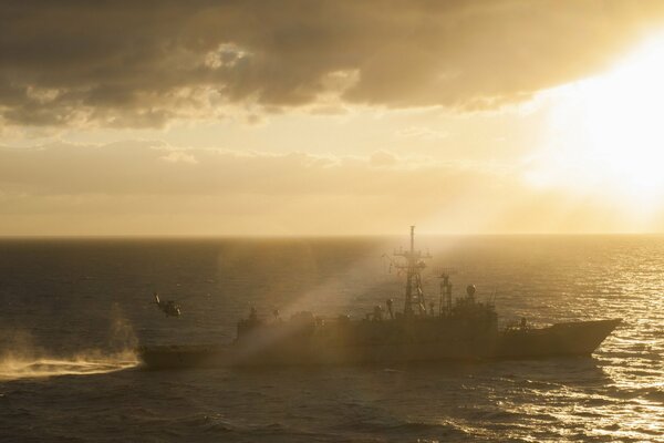 A warship drifting at sea