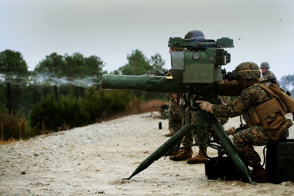 A soldier shoots from a pro-tank missile system