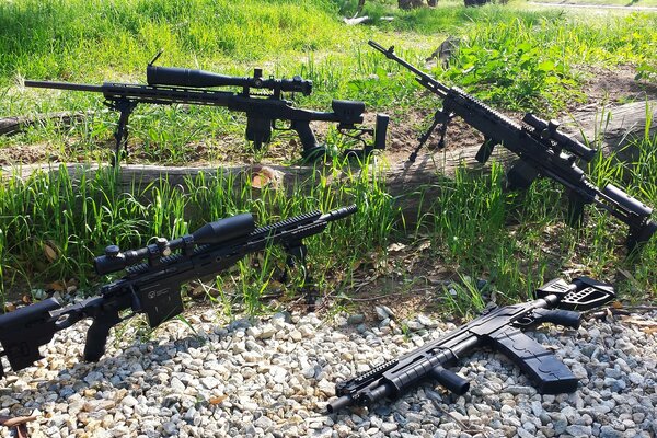 Exhibition of weapons on sand and grass