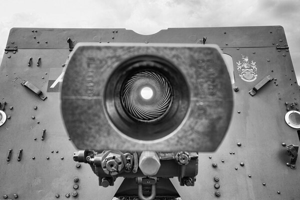 Black and white muzzle of a combat cannon