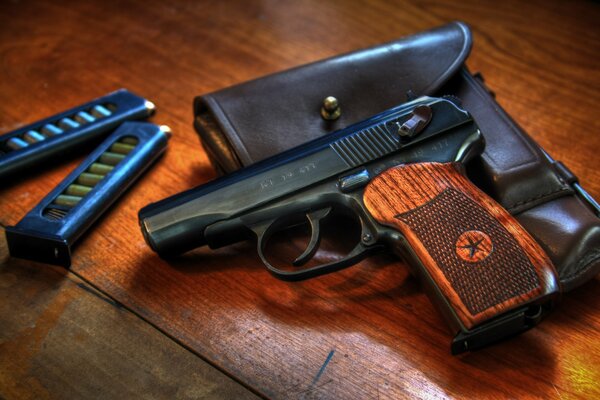 Makarov pistol with a full magazine of cartridges