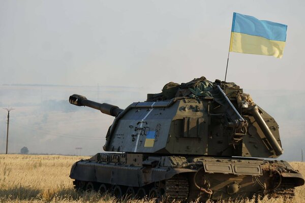 Military tank with the flag of Ukraine